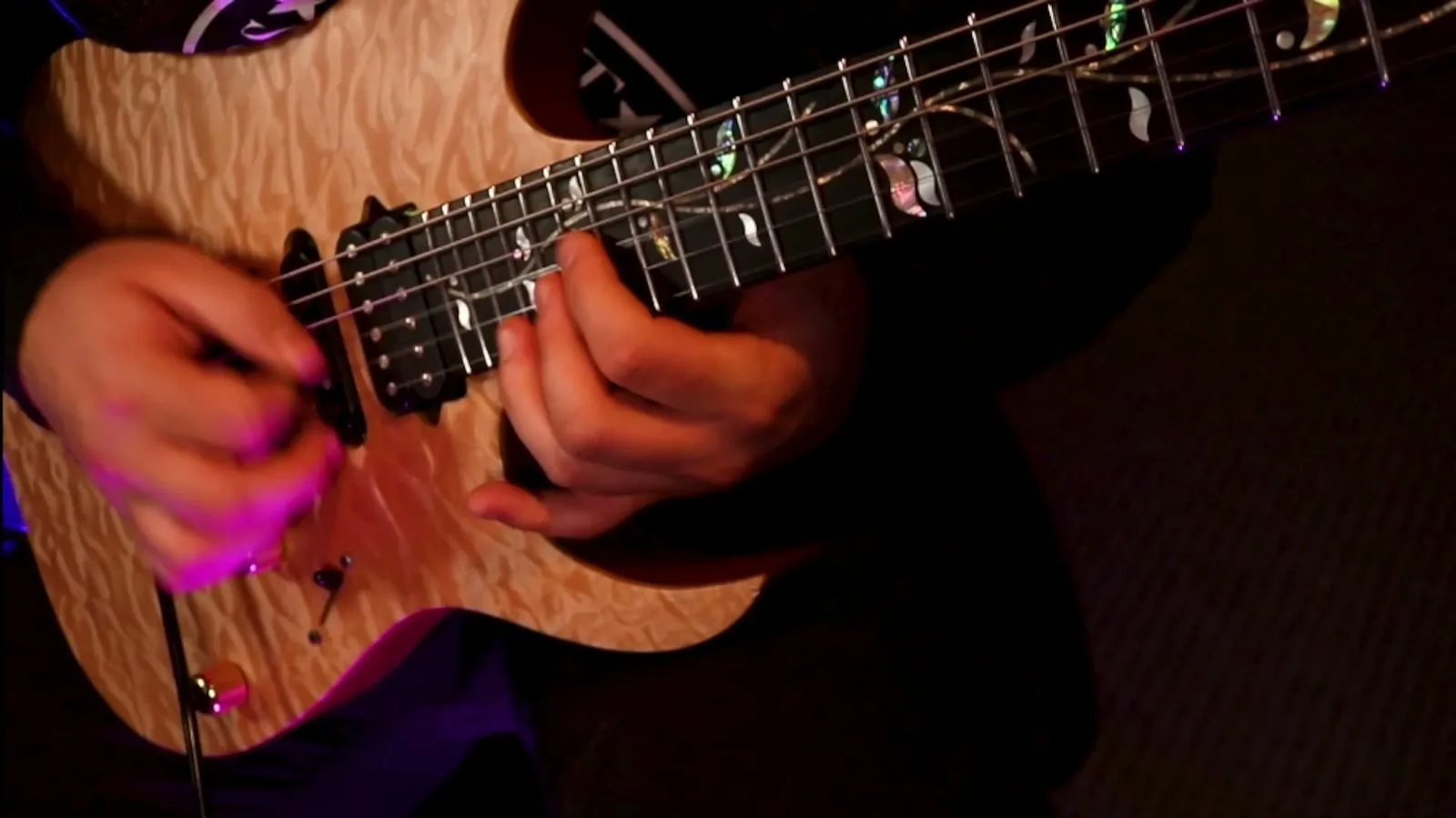 Zach Adkins picking hand close-up